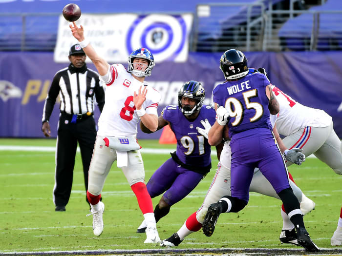Dec 27, 2020; Baltimore, Maryland, USA; New York Giants quarterback Daniel Jones (8) throws a pass in the third quarter against the Baltimore Ravens at M&T Bank Stadium.